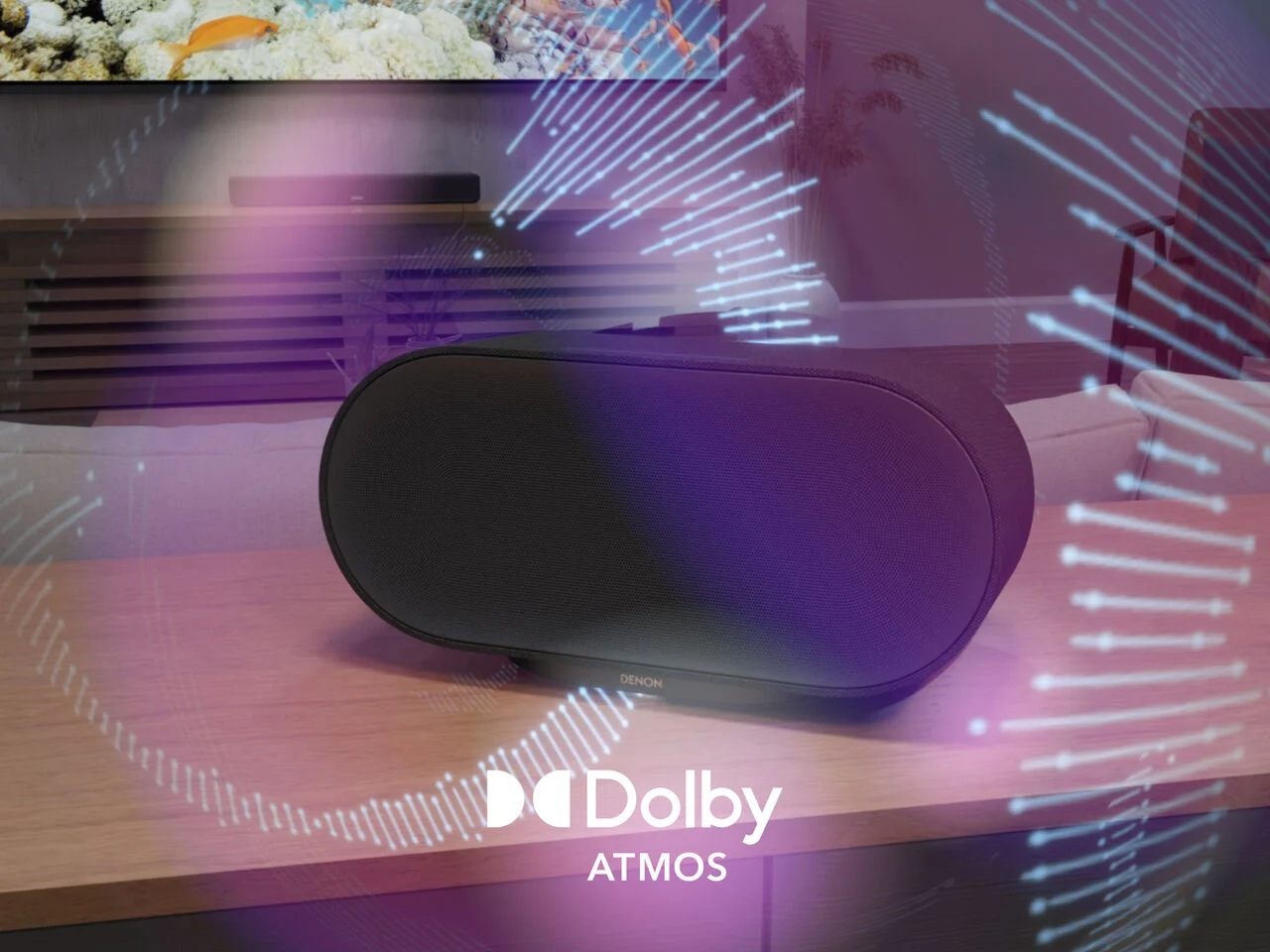 Das Bild zeigt den Denon Home 600 in schwarz von vorne mit einem Dolby Atmos Logo.